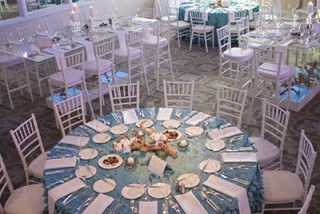 table setting with blue tablecloth