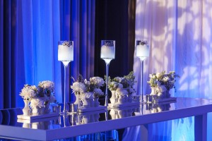Glass table with candle centerpiece