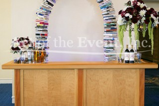 bar with book archway behind it