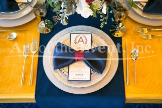 table setting with navy blue napkin