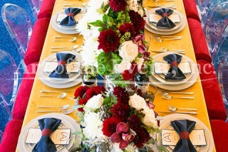 full table setting with floral centerpieces