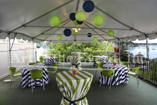 tented area with tables and decorations